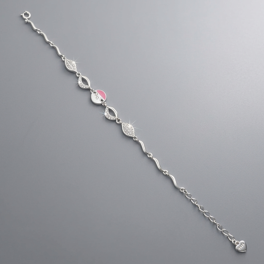 Detailed close-up of the Pink Enamel & Pave Leaf Silver Bracelet on a smooth gray background, focusing on the sparkling cubic zirconia leaves and the geometric split-circle pink enamel design