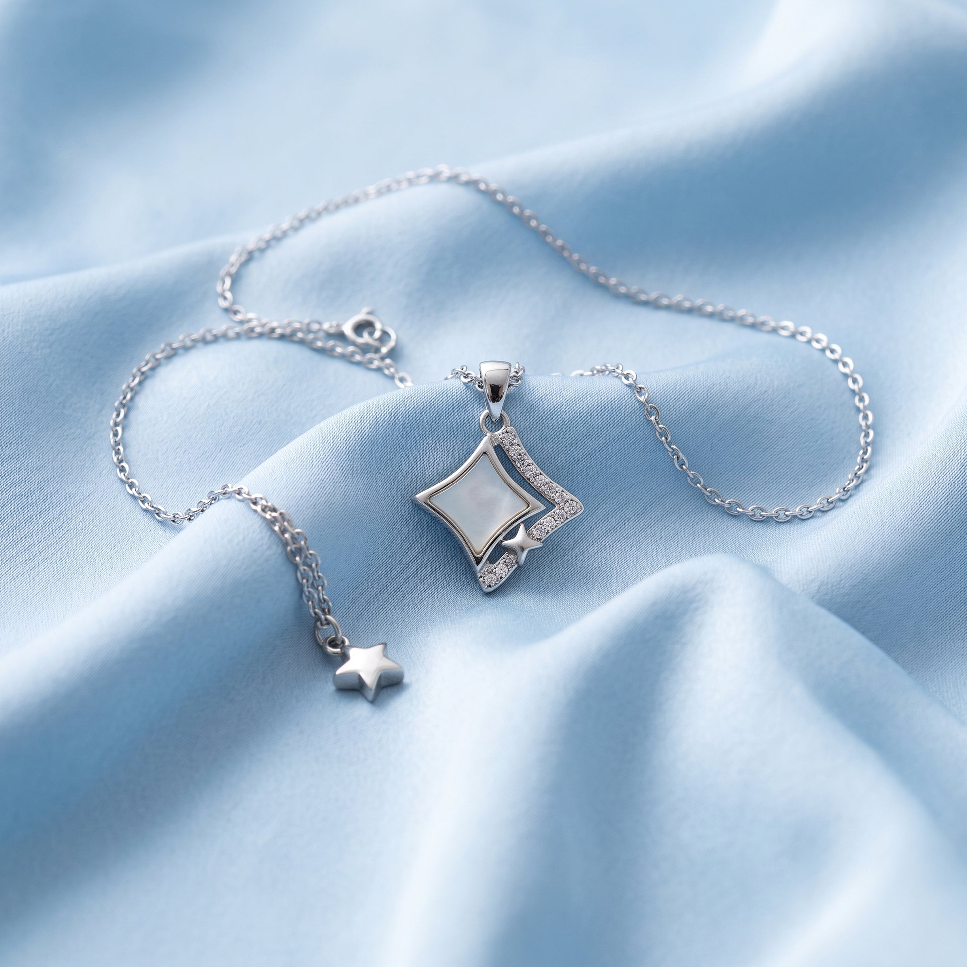 Silver Kite Pendant Necklace with Star Accent