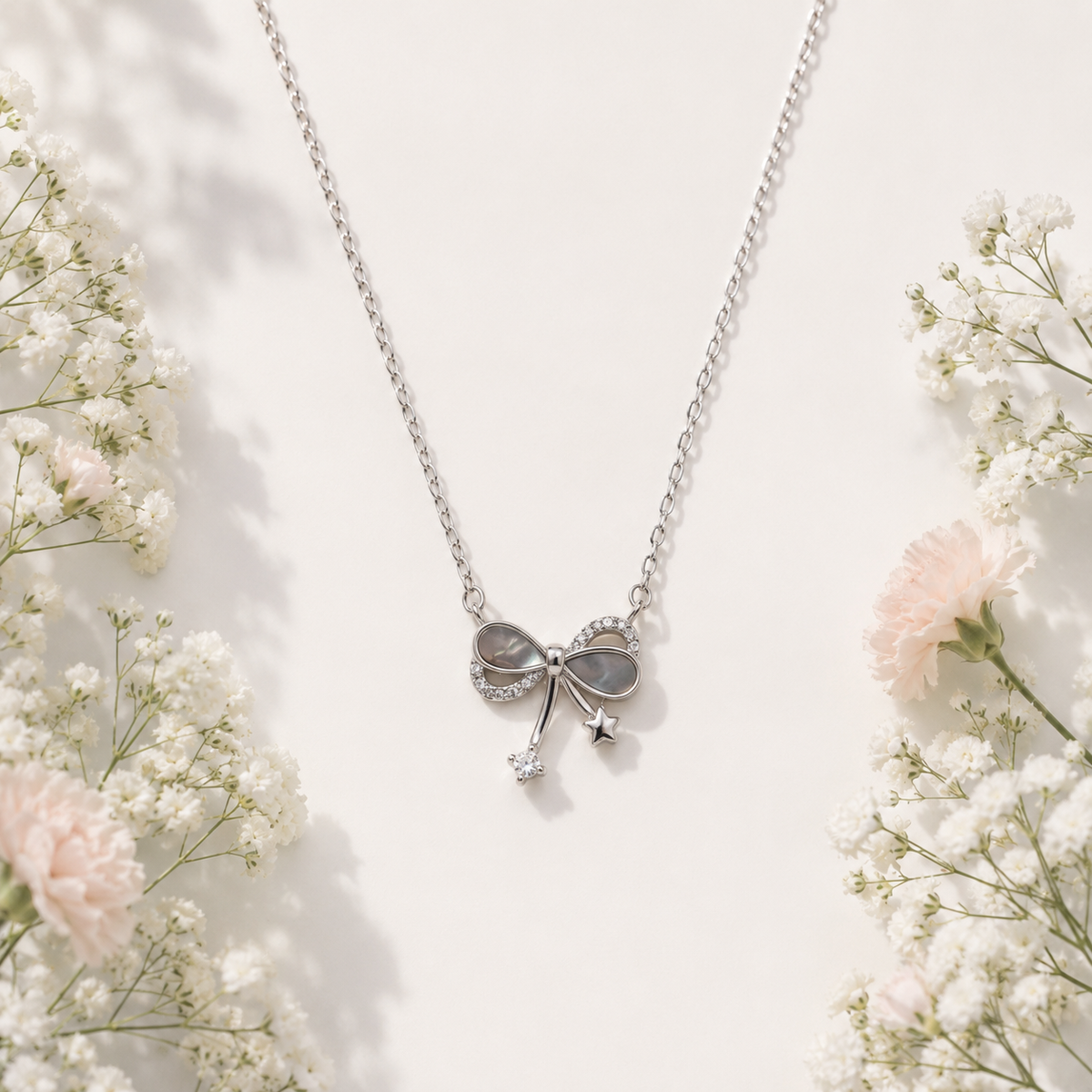 Silver Pearl Bow Pendant Necklace