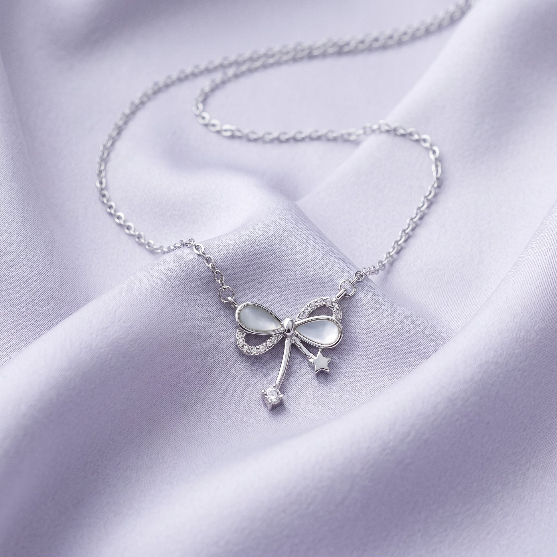 Silver Pearl Bow Pendant Necklace