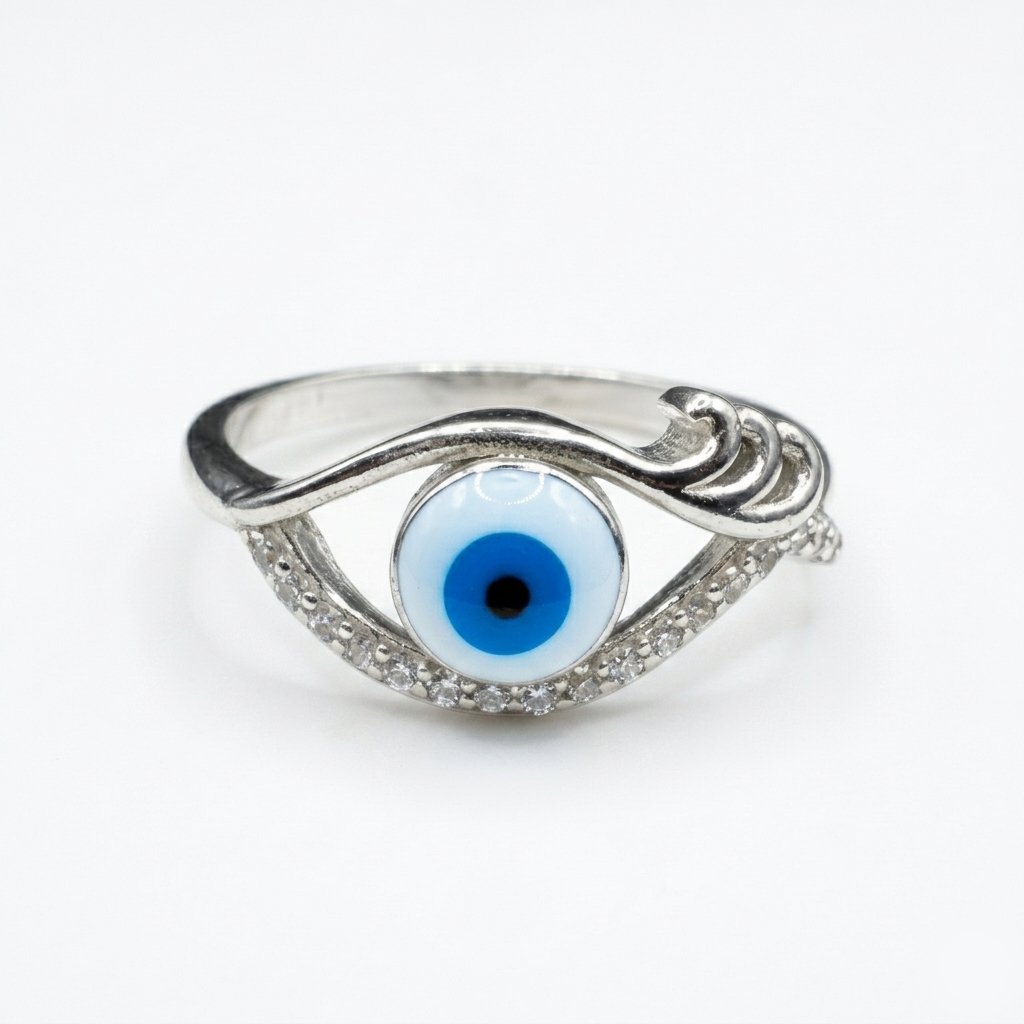Detailed macro studio shot of the Blue Evil Eye Silver Ring showcasing the micro-pave stones and domed enamel center