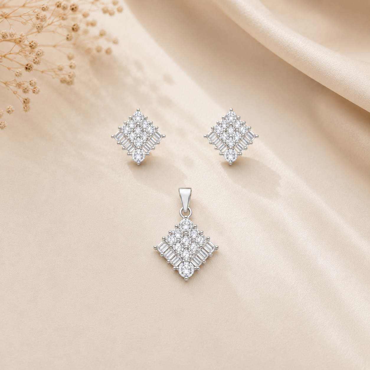 Sterling silver matching stud earrings with brilliant baguette stone accents