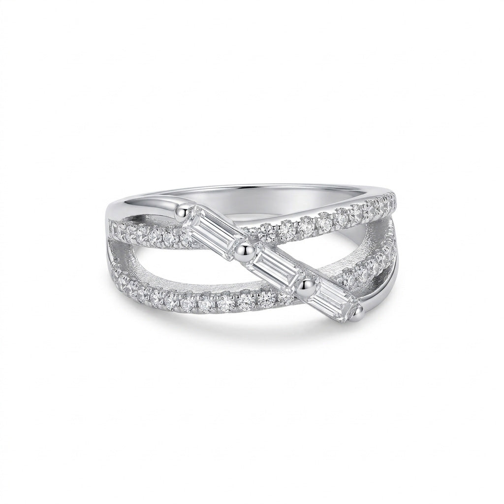Studio shot of a Triple Baguette Crystal Crossover Silver Ring on a white background.