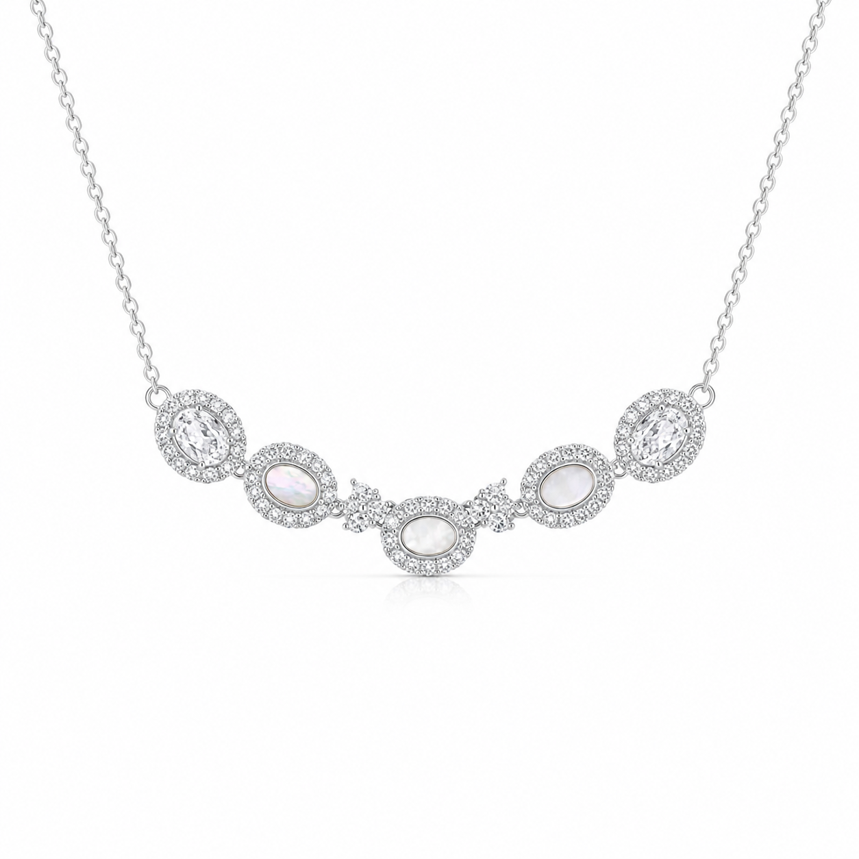 Front view of the elegant five-stone crystal cluster sterling silver necklace displaying its curved centerpiece.