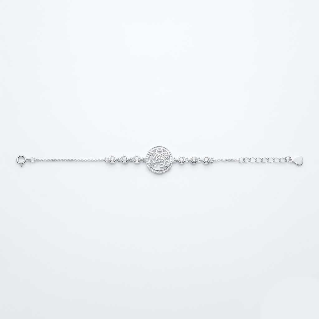 Top-down flat lay view of the Eternal Bloom Circle Silver Bracelet displaying the spring ring clasp, bezel-set side stones, and adjustable heart chain