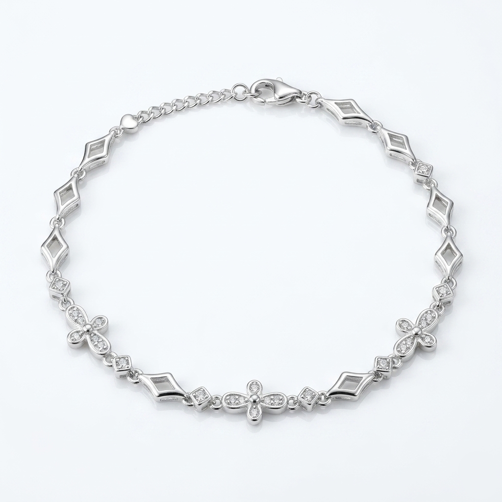 Flat view of the Floral Diamond Pattern Silver Bracelet showing the alternating geometric and flower pattern with a lobster clasp and extension chain