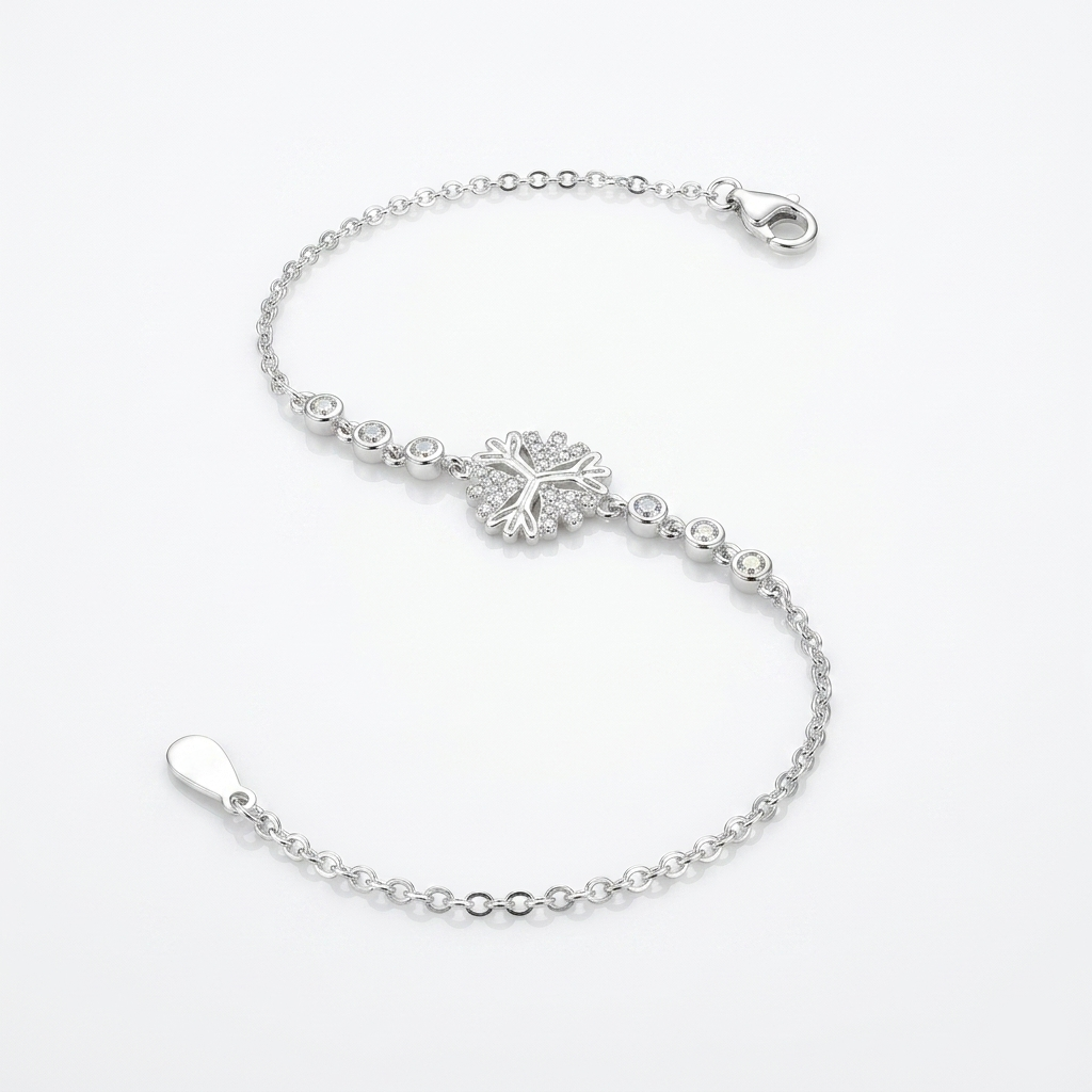 Close-up studio shot of a Floral Snowflake Silver Bracelet featuring a stone-studded floral snowflake design and a lobster clasp.