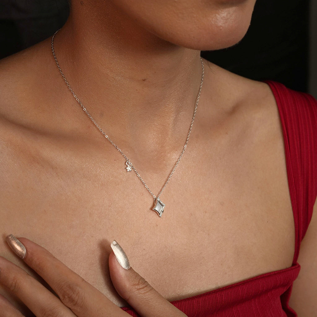 Silver Kite Pendant Necklace with Star Accent