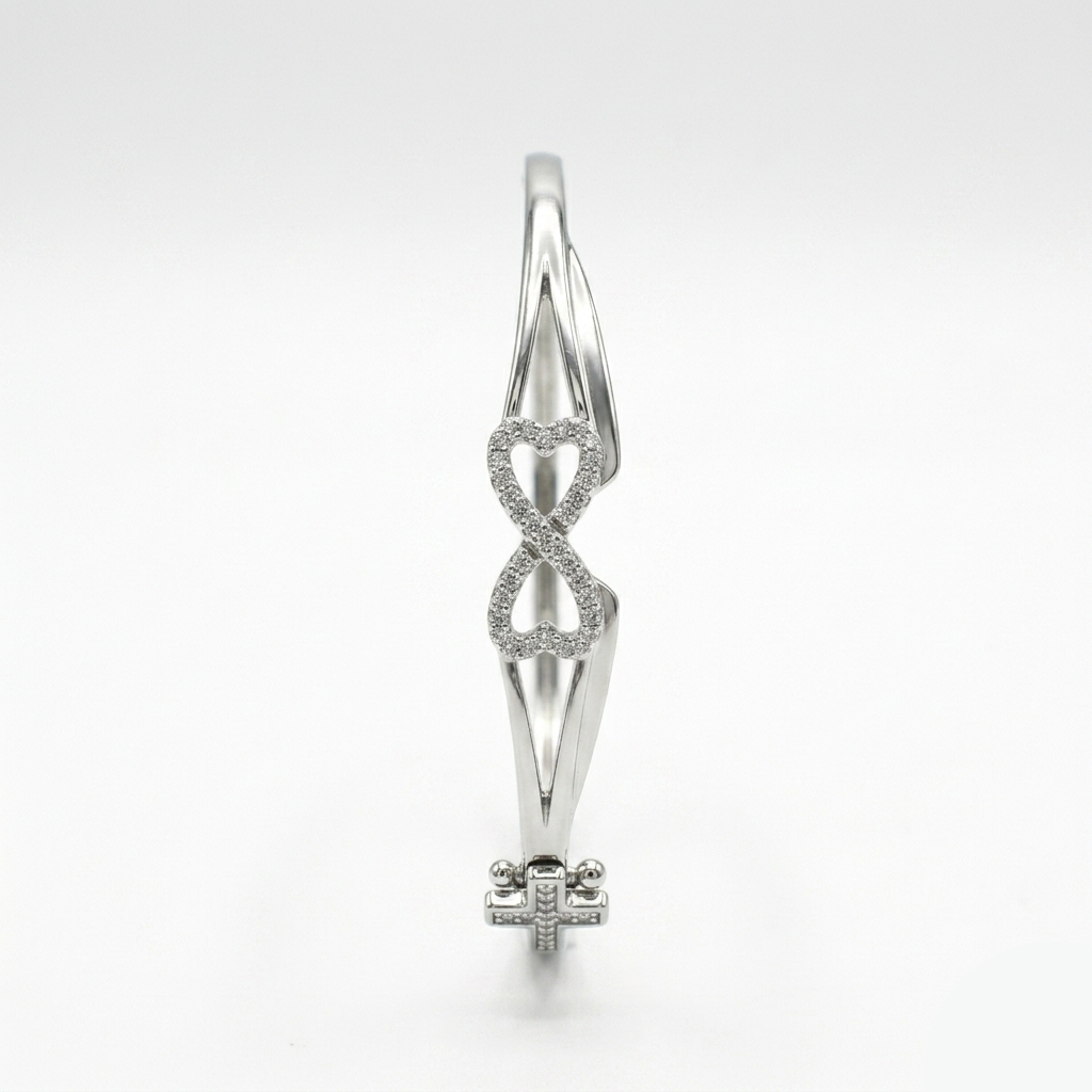  Side profile of the Infinity Design Silver Bracelet displaying the stone-studded push-button hinge clasp