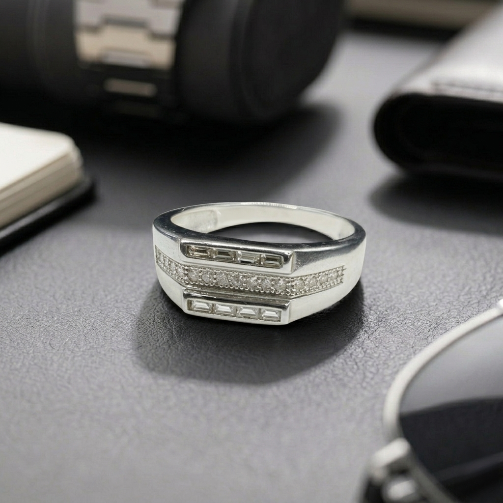 Close-up of the Luxury Silver Ring on a dark textured surface next to a watch and sunglasses