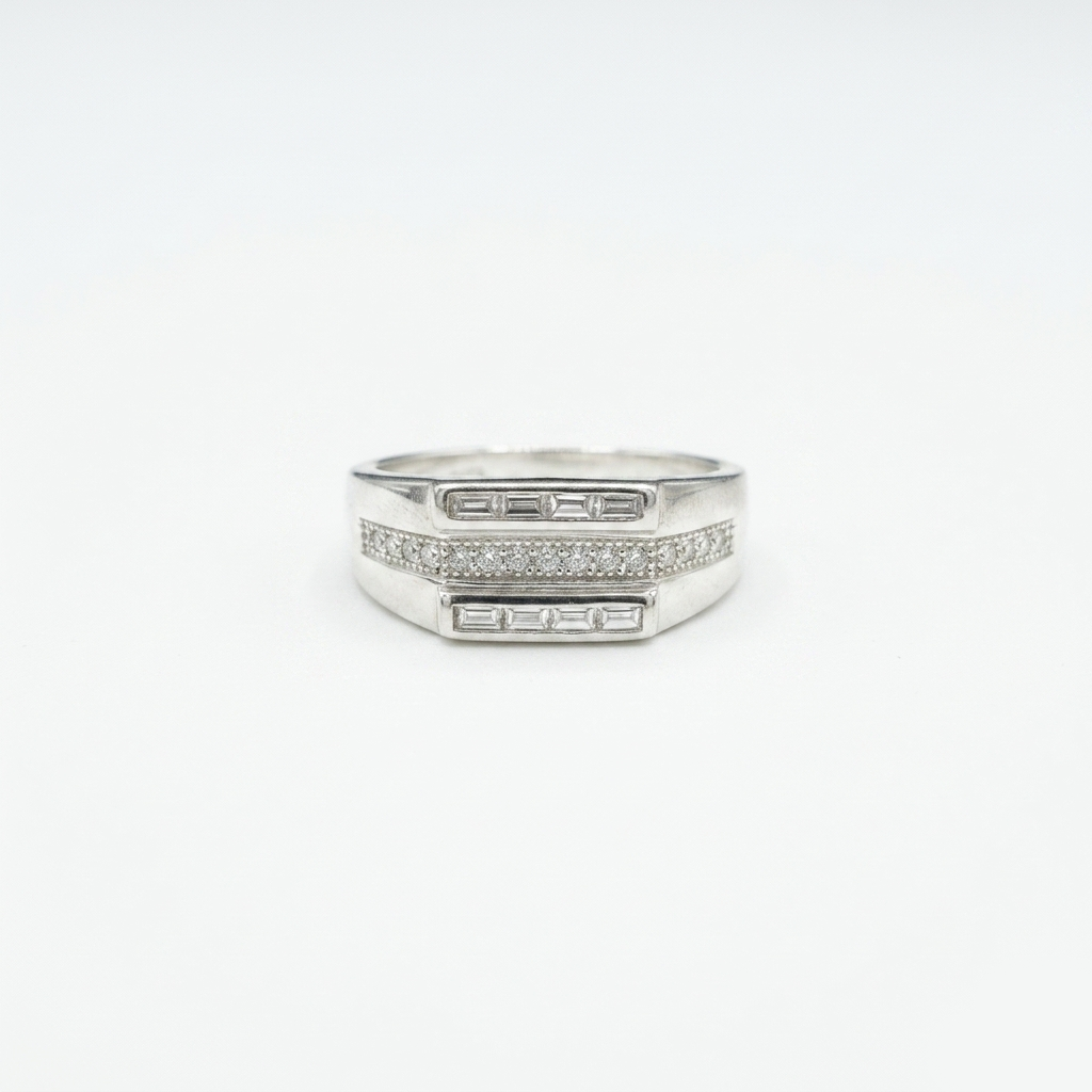 Straight-facing macro shot of the triple-row Luxury Silver Ring showcasing the channel-set baguette stones on a white background
