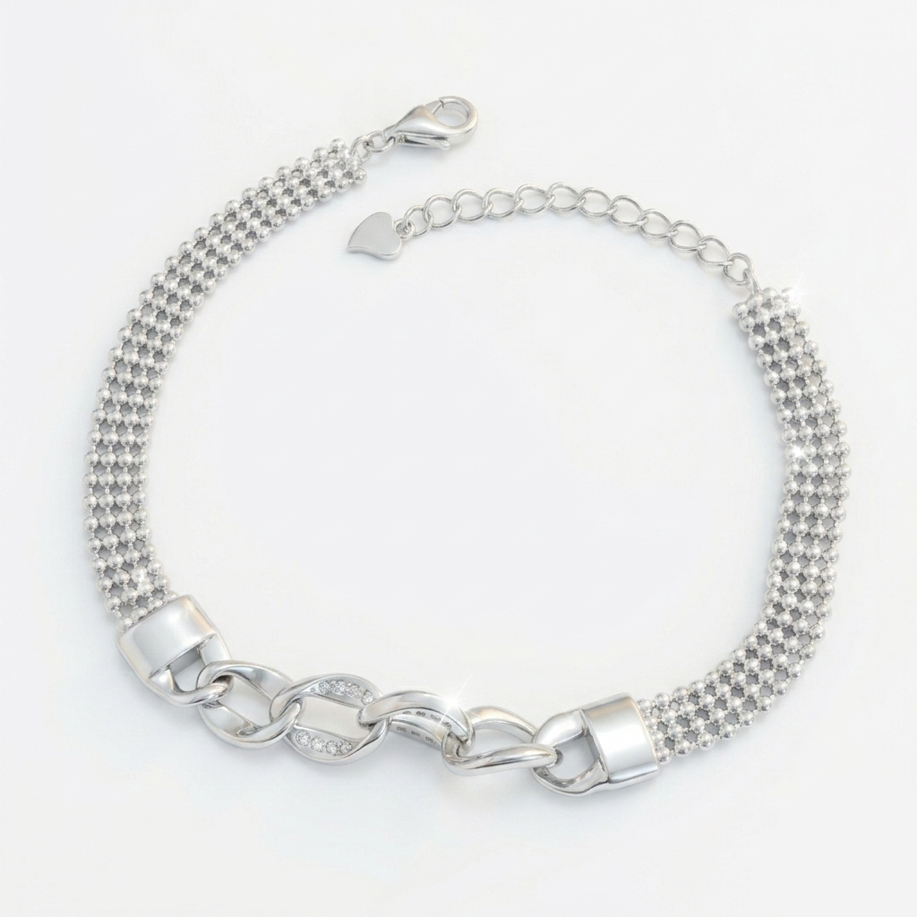 Modern Mesh & Curb Link Fusion Silver Bracelet resting on a white marble surface with pearls