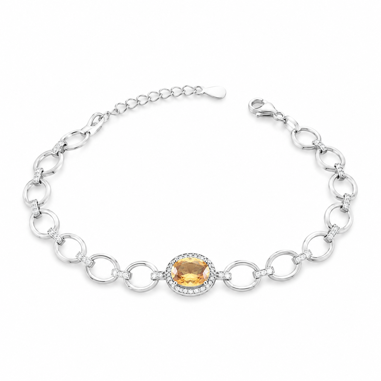 Silver link bracelet featuring an oval yellow citrine stone with a crystal halo