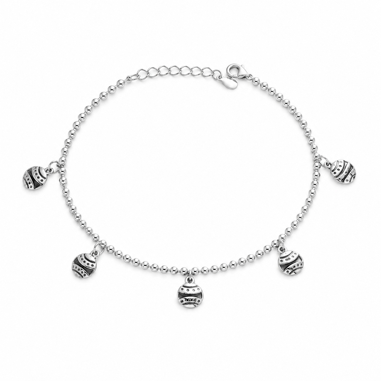 Top down view of the Oxidized Silver Beaded Chain Bracelet with Patterned Charms showing the S-hook closure and link extender
