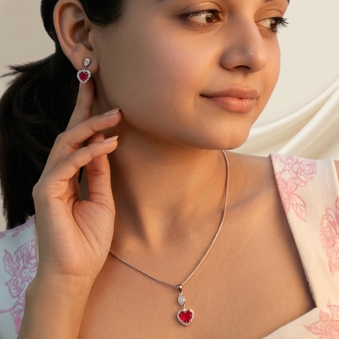 Full jewelry set showing the delicate chain, pendant, and earrings