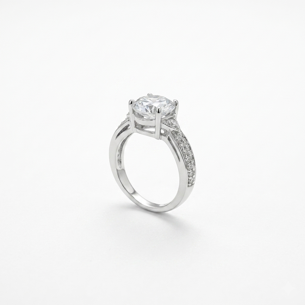 Studio shot of the Shahi Solitaire Silver Ring on a plain white background detailing the four-prong setting and pavé band.