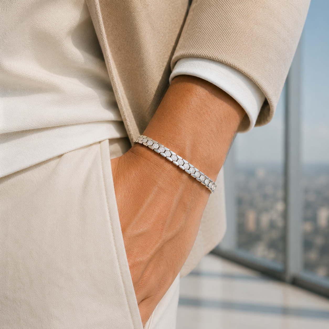 Close-up highlighting the geometric hexagon links and crystal setting on the silver bracelet