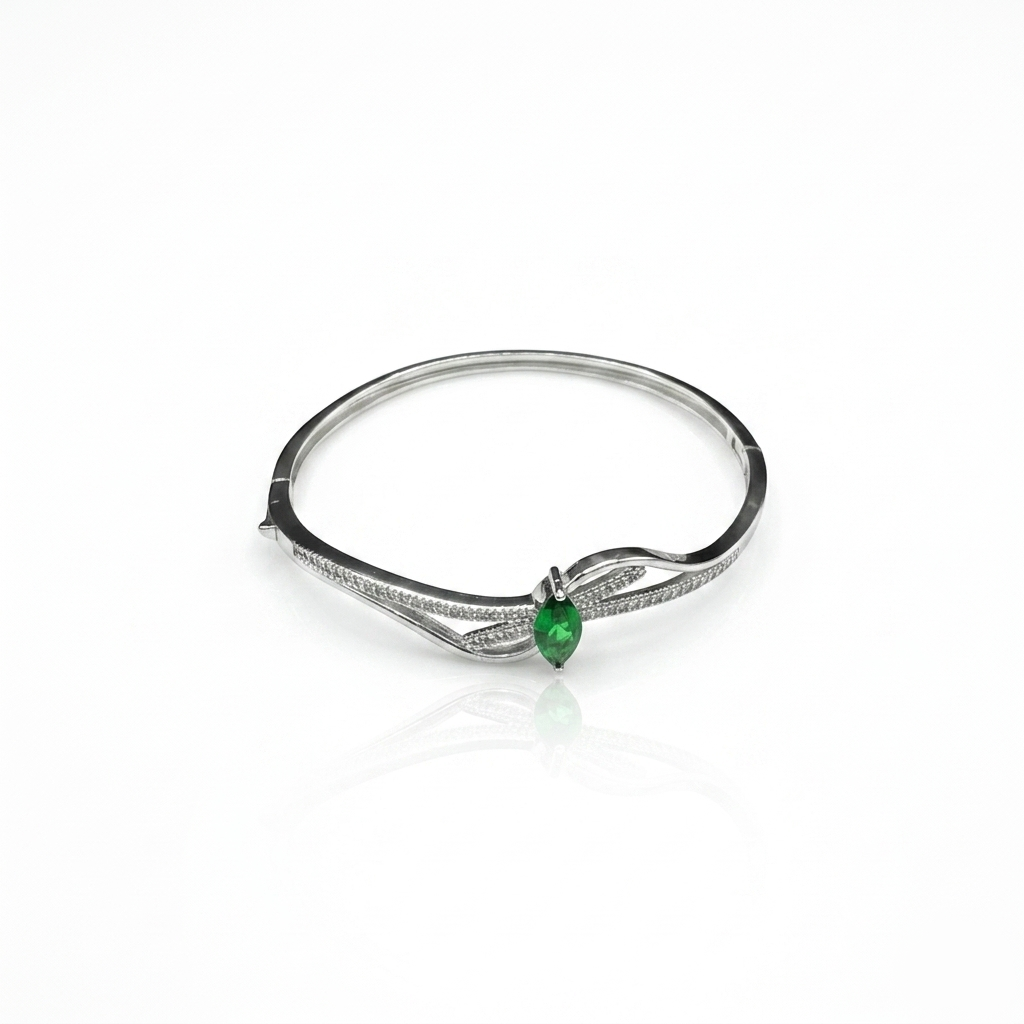 Frontal view of the Silver Green Stone Kada for Women showing the clasp and intertwined CZ bands on a white background