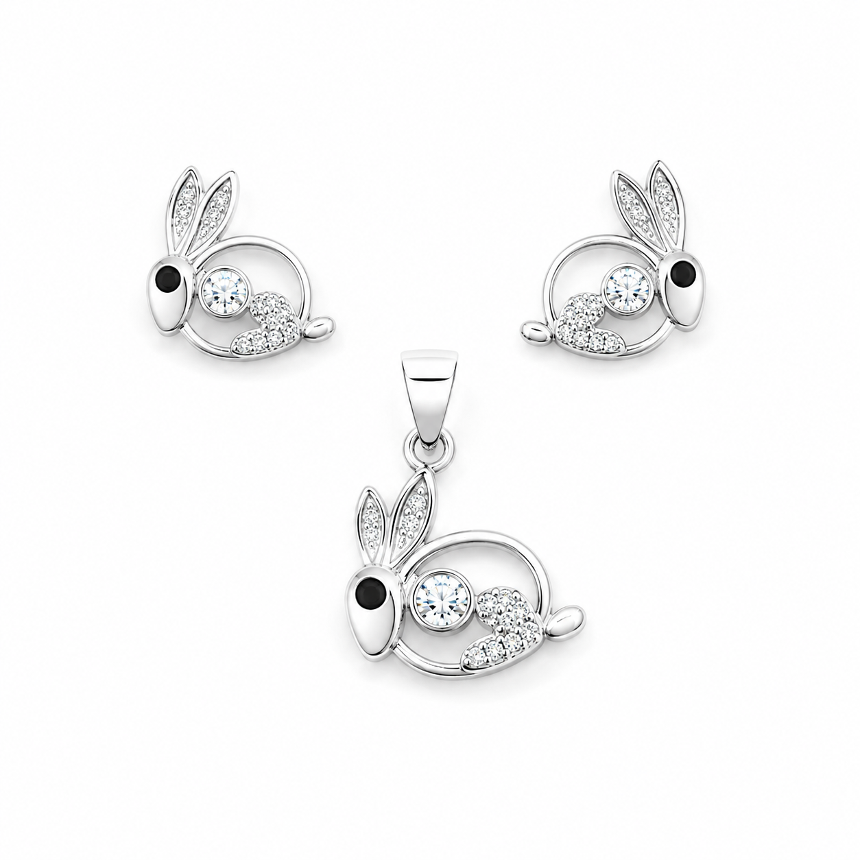 Silver rabbit pendant and matching stud earrings set with clear crystal centers and black eyes on a white background.