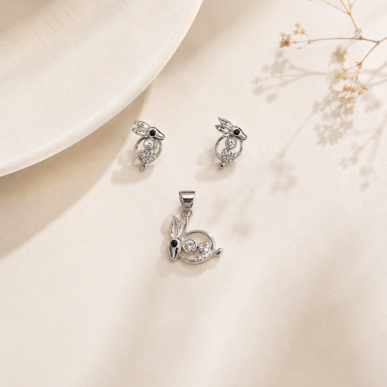Close-up of the Sparkling Crystal Bunny Sterling Silver Pendant Set showing intricate ear textures and stone placements.