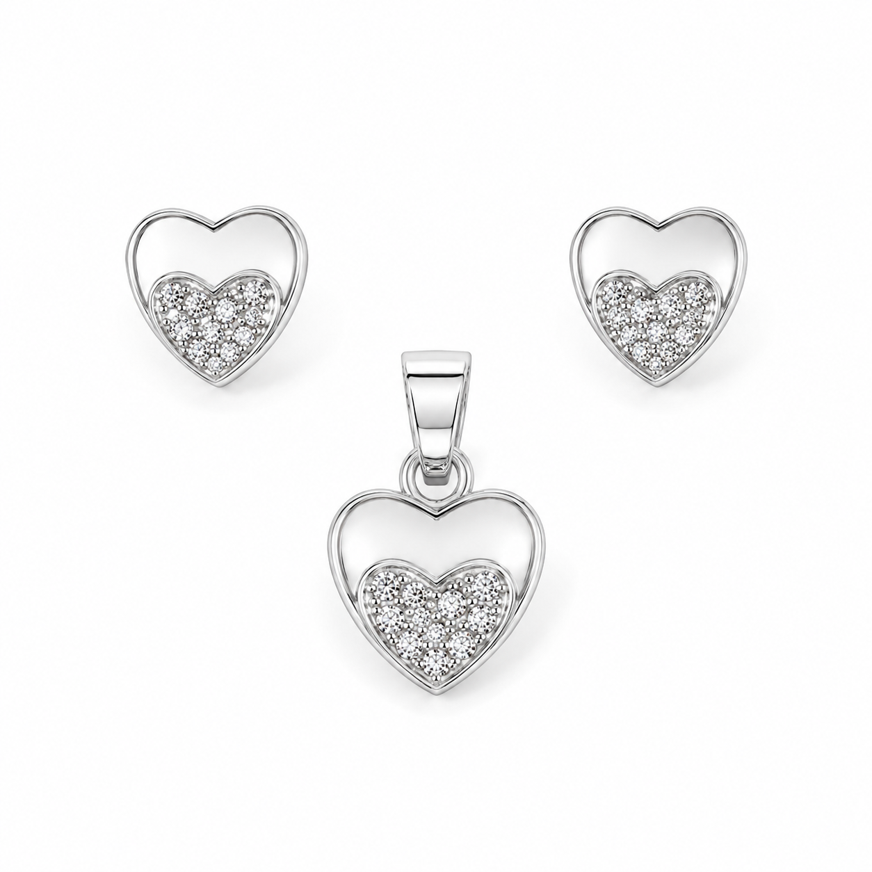 Front view of the Sparkling Nested Heart Silver Pendant Set showing two earrings and one matching pendant.