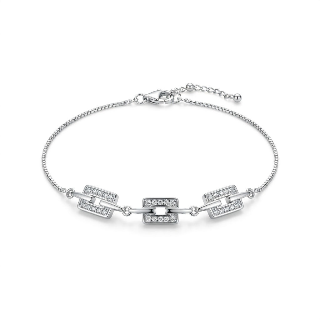 Front view of the sterling silver box chain anklet displaying three rectangular pavé geometric charms