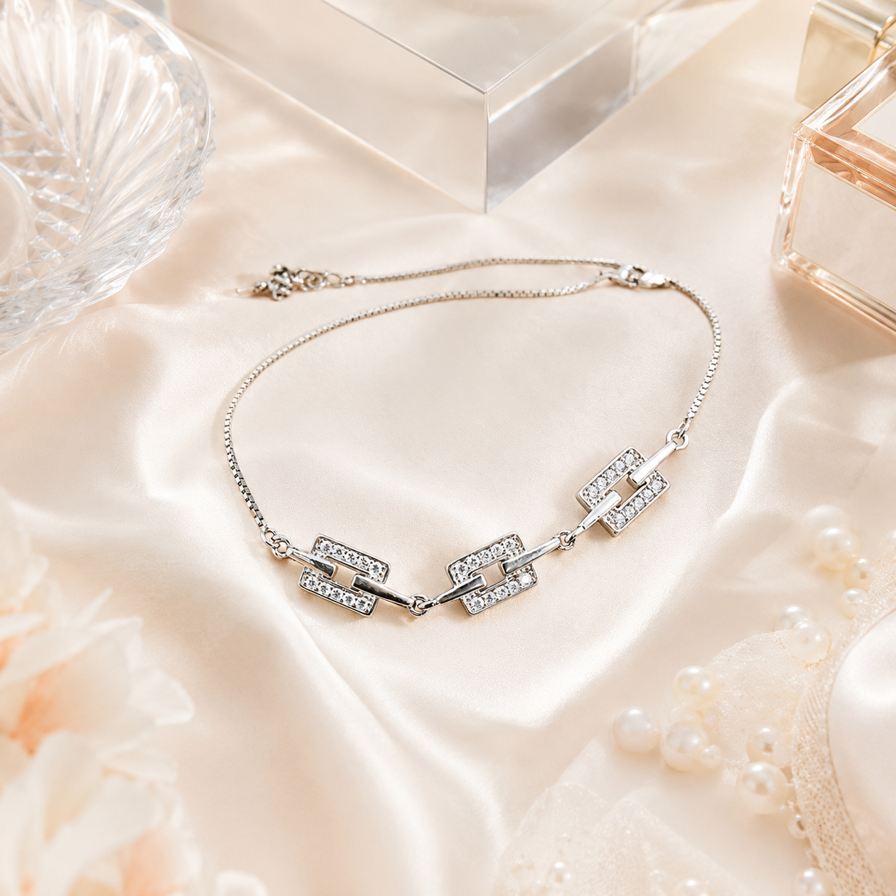 Close-up of the silver anklet highlighting the lobster clasp and adjustable extender chain