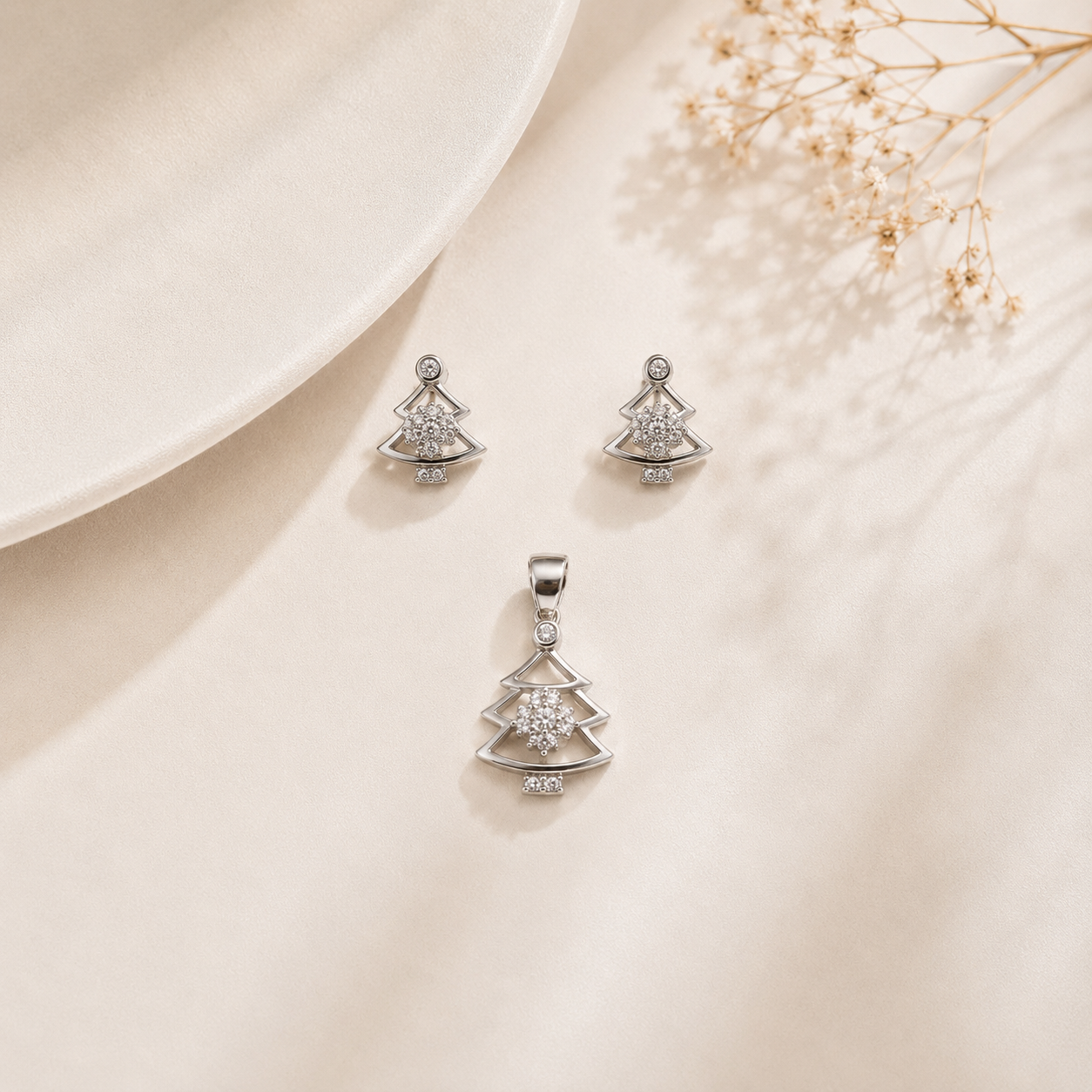 Close-up of the delicate snowflake design inside the silver Christmas tree jewelry