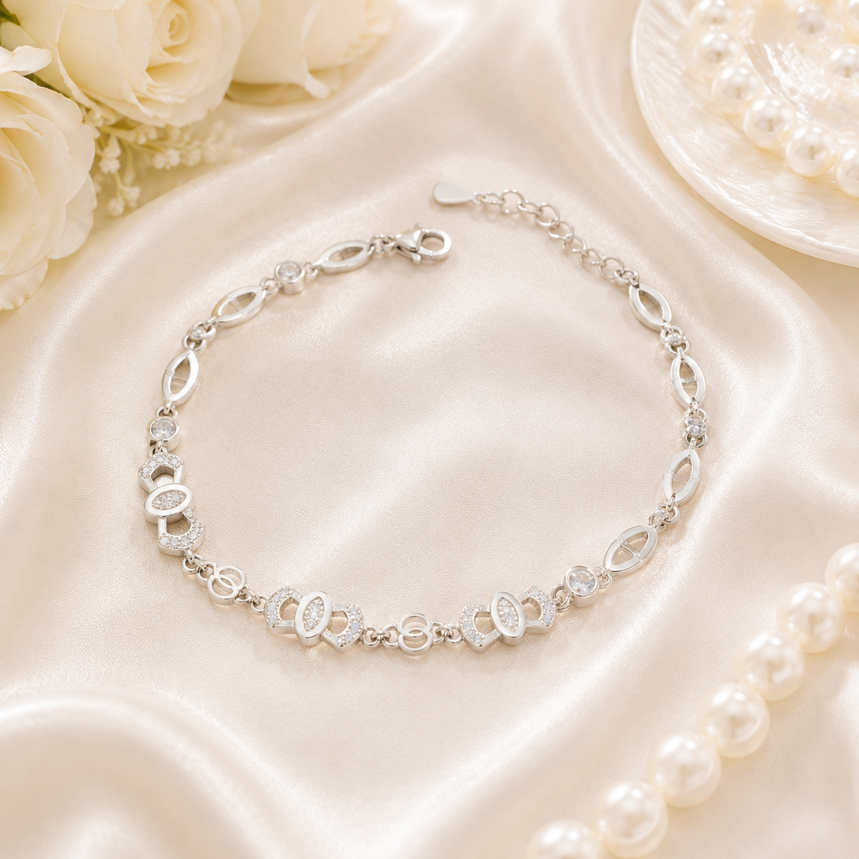 Top view of the dainty sterling silver bracelet with interlocking figure-8 motifs