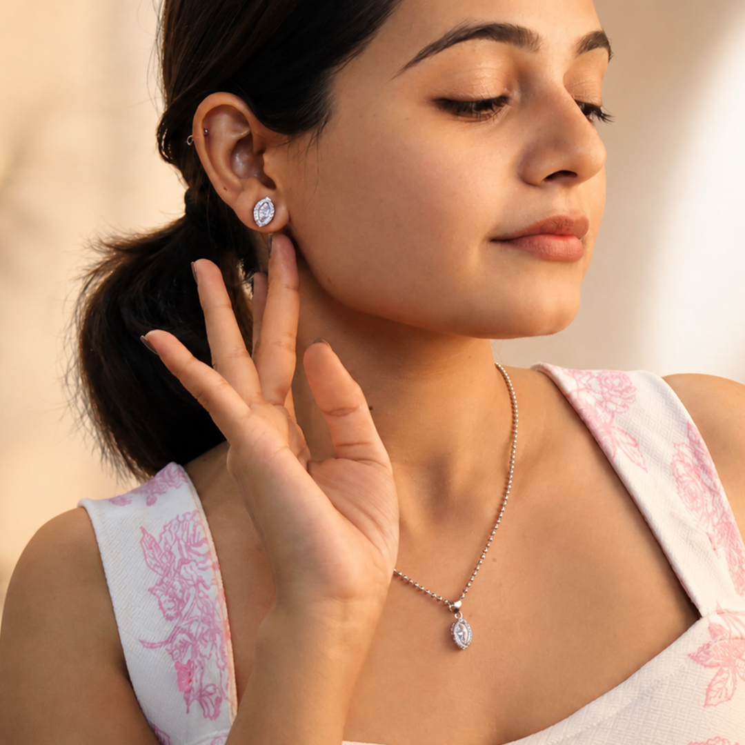 Detailed view of the marquise cut central stones in the pendant and earrings