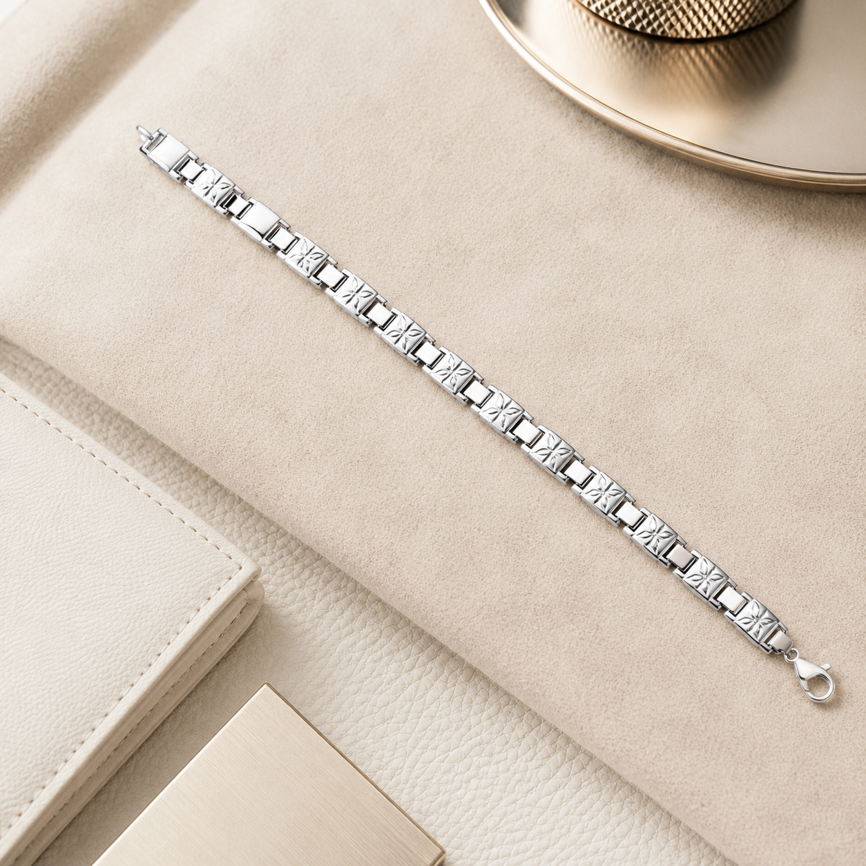 Detailed shot of the interlocking mechanism on the sterling silver patterned men's bracelet.