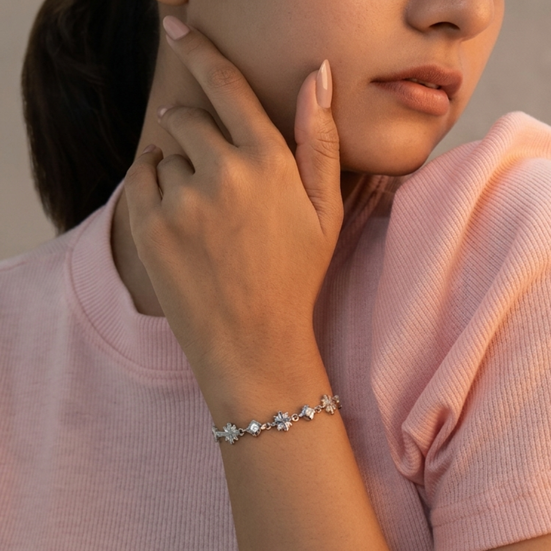 Top-down view of the elegant sterling silver star and flower design wristwear