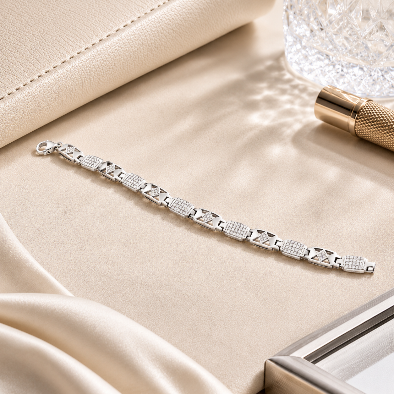 Top down angle of the X-pattern textured men's silver bracelet laid flat in a perfect circle