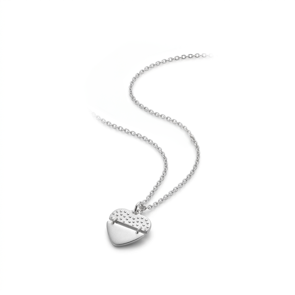 Silver Textured Heart Pendant Necklace with a textured and polished split heart pendant displayed on a plain white background.