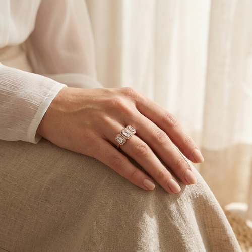Emerald-Cut Three-Stone Halo Ring
