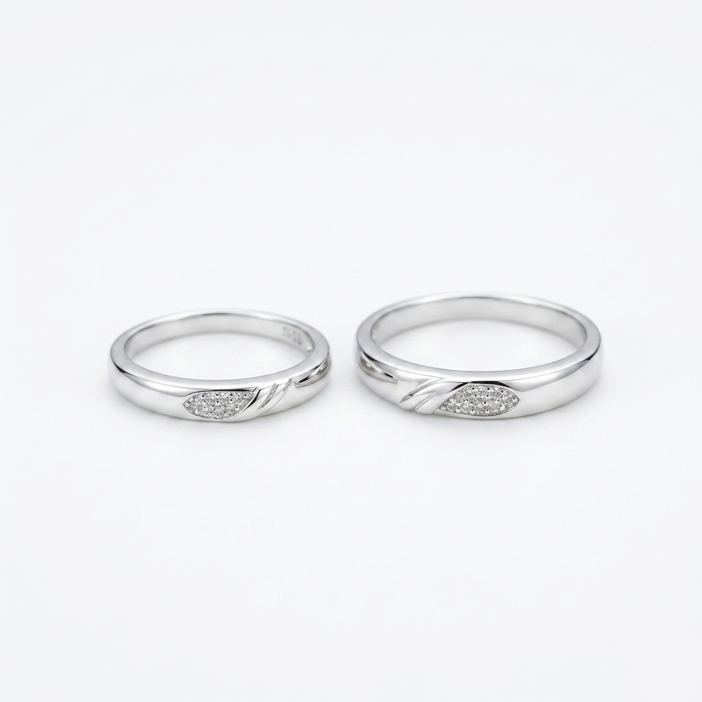Two silver Matching Silver Pave Leaf Couple Bands displayed on a clean white background