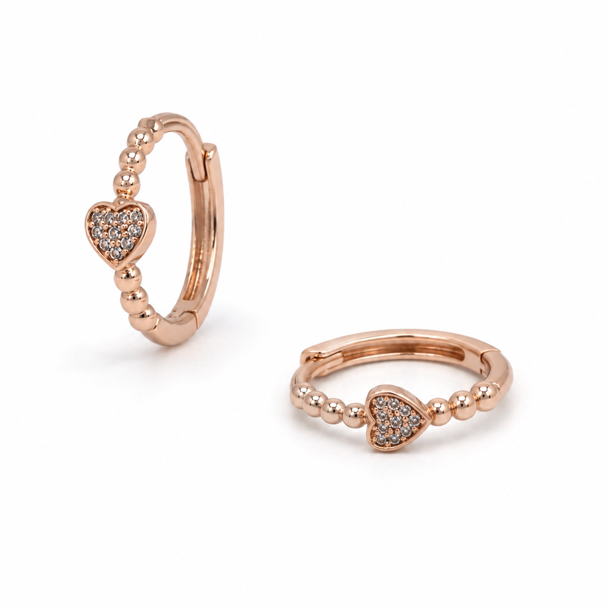 Silver and Rose Gold Heart Huggie Earrings_01