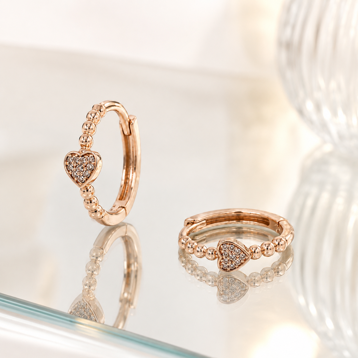 Silver and Rose Gold Heart Huggie Earrings_03