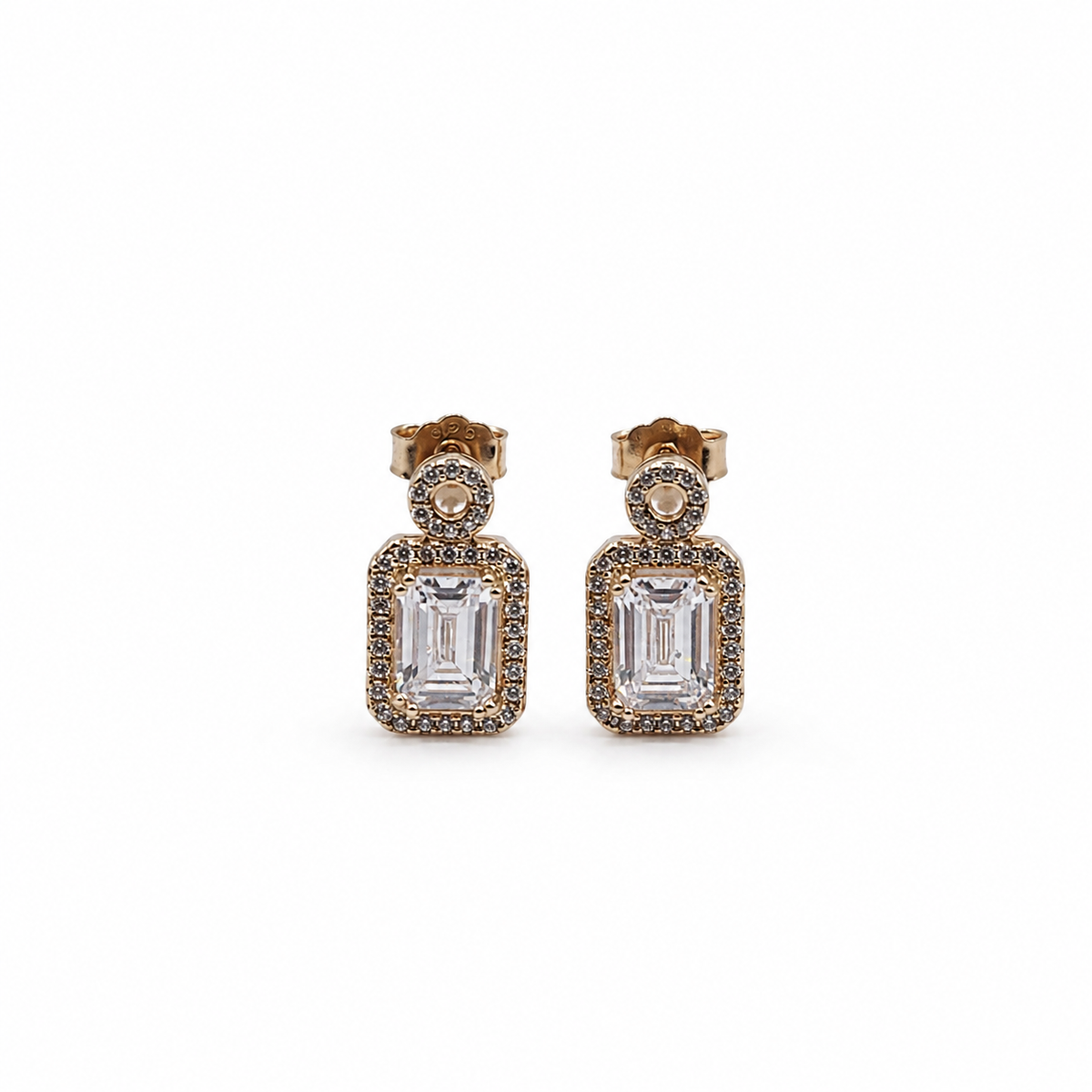 Rose Gold Round Halo Emerald Cut Drop Earrings with a round halo top and emerald-cut centre stone framed by a rectangular halo
