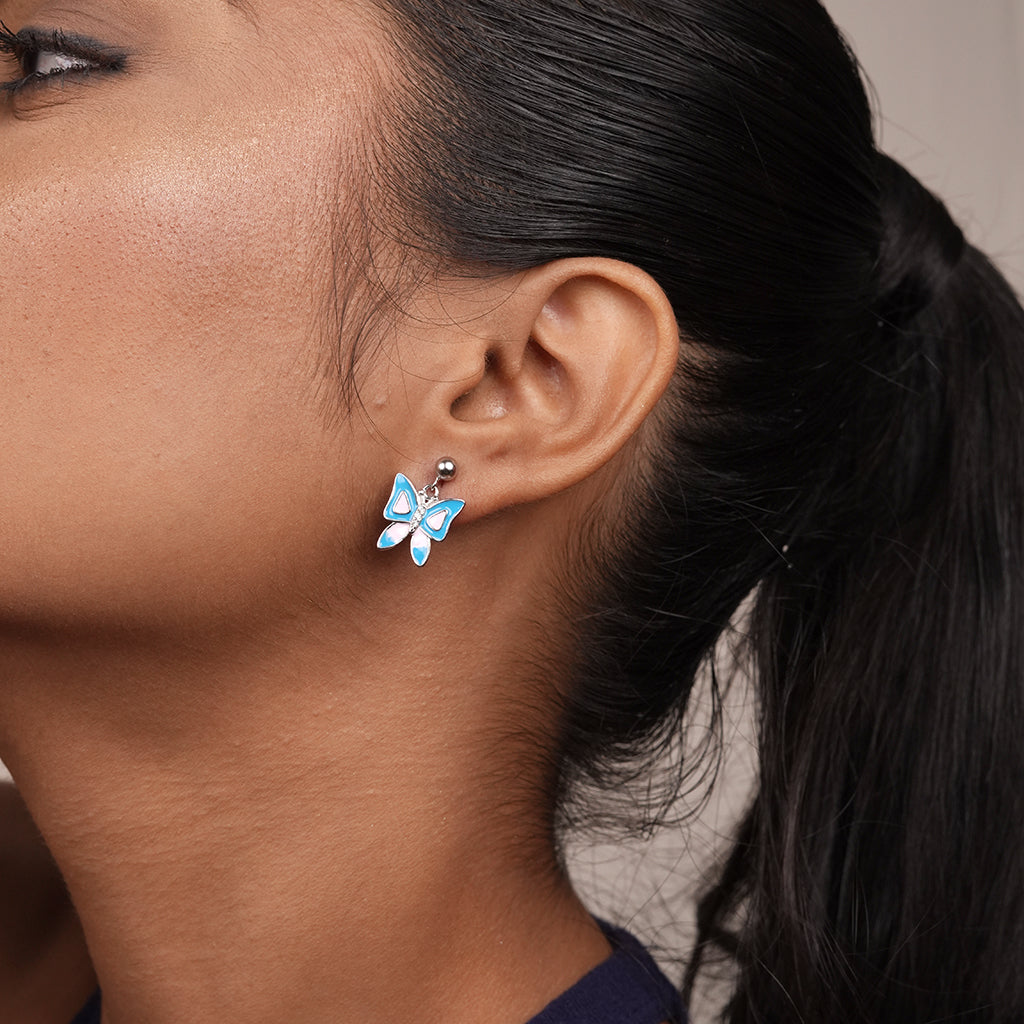 Close-up of Silver Blue and Pink Enamel Butterfly Drop Earrings showing layered butterfly wings with blue and pink enamel detailing