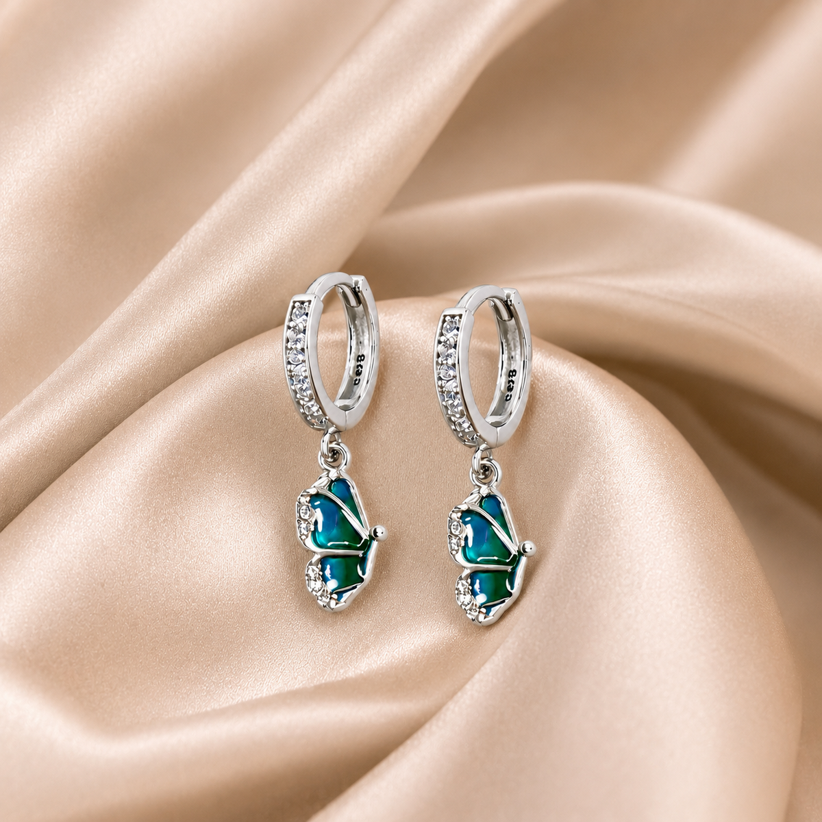 Silver Blue Pear Drop Huggie Earrings
