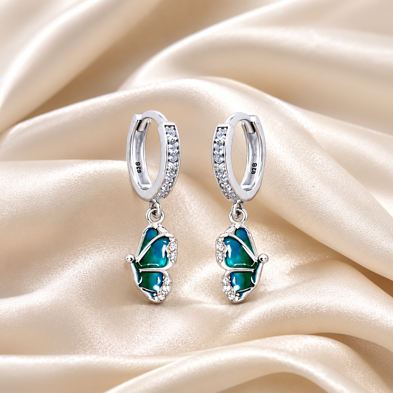 Silver Blue Pear Drop Huggie Earrings