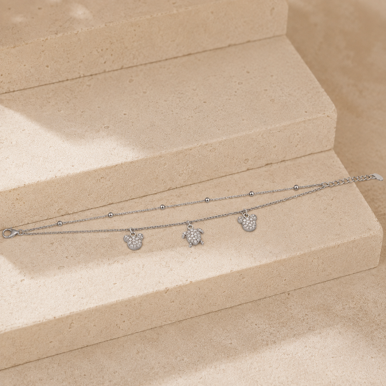 Double chain silver anklet with hanging animal charms