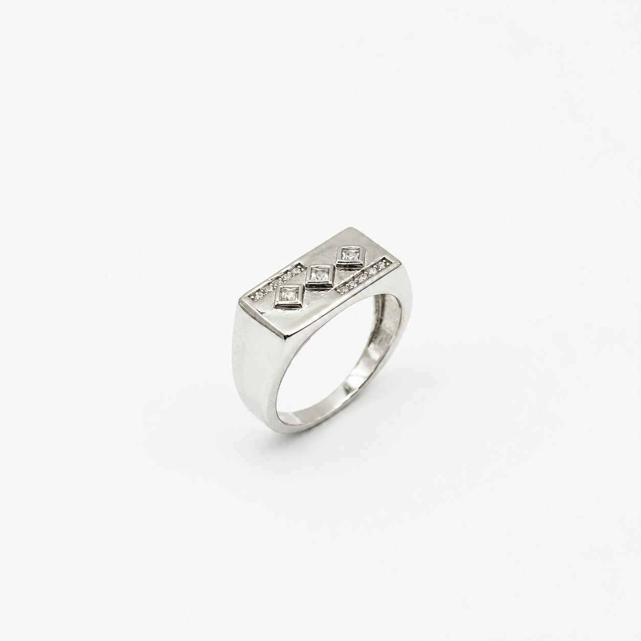 Silver signet ring with a diamond shaped face