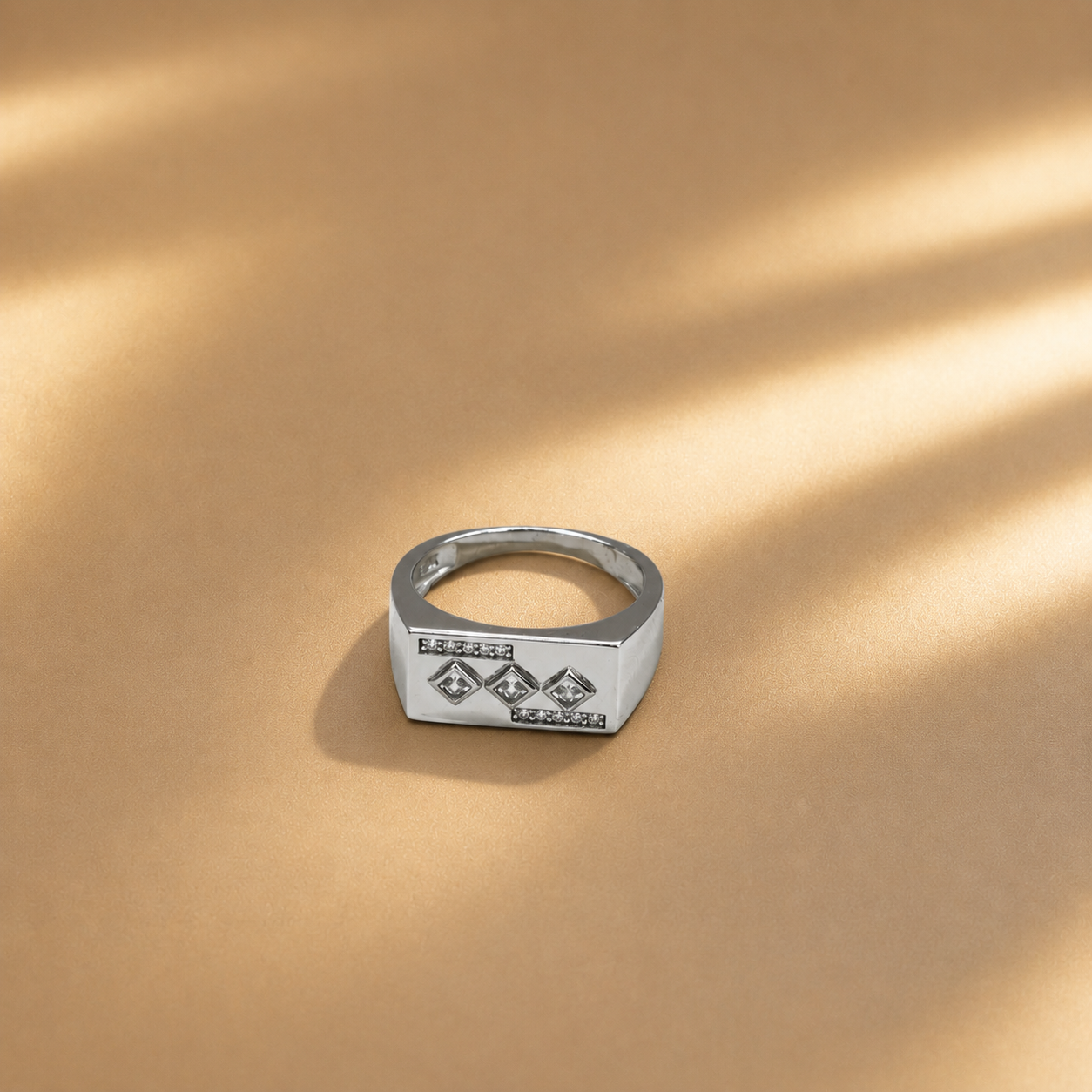 Diamond shape signet ring with a centre CZ stone