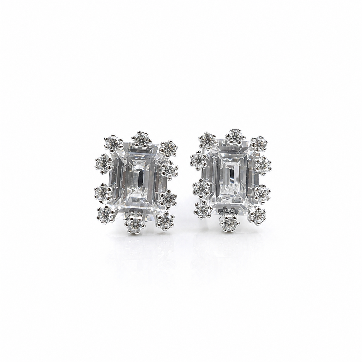 Silver Emerald Cut Scalloped CZ Stud Earrings with large emerald-cut centre stones framed by round CZ clusters