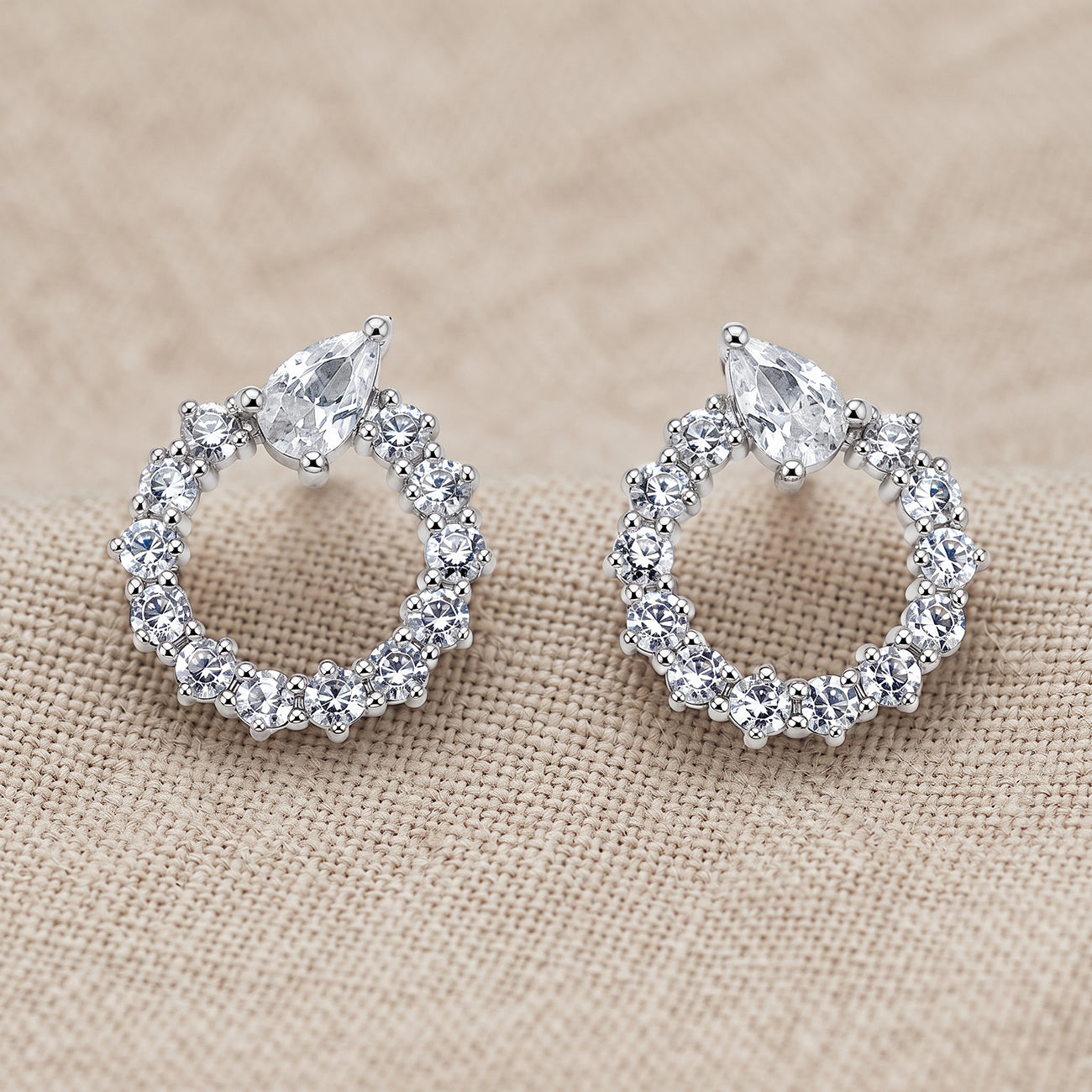 Silver Open Circle Pear Accent Stud Earrings
