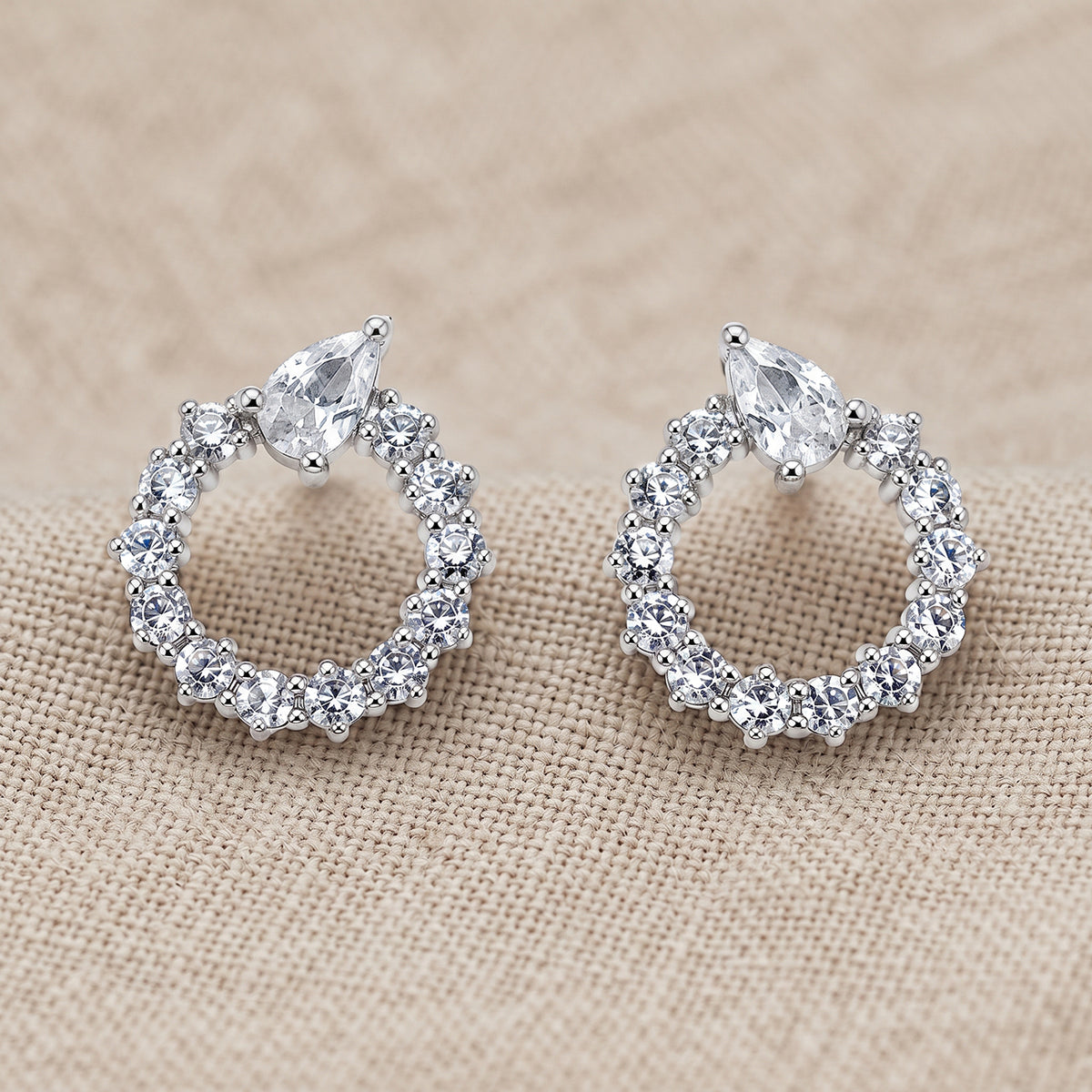 Silver Open Circle Pear Accent Stud Earrings