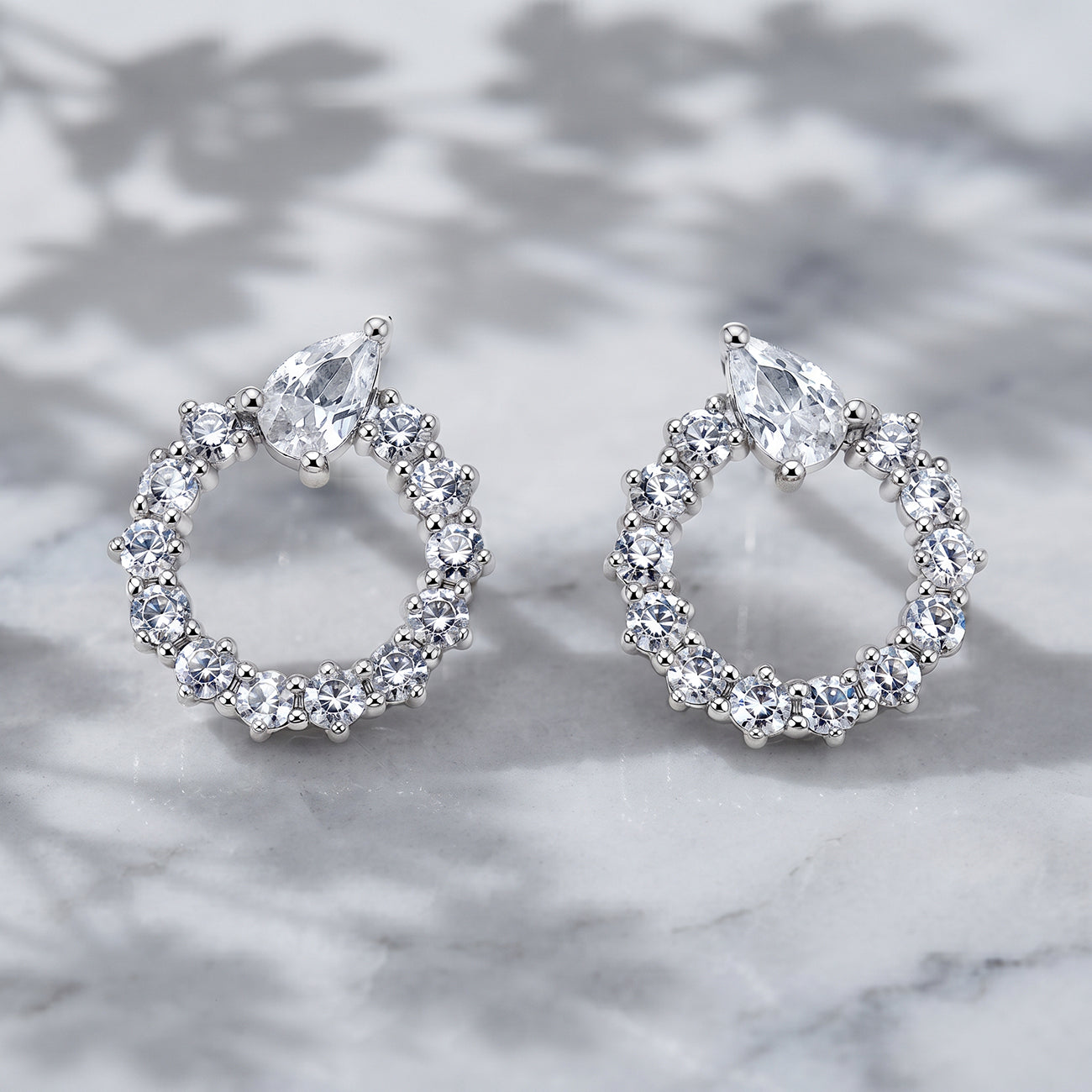 Silver Open Circle Pear Accent Stud Earrings