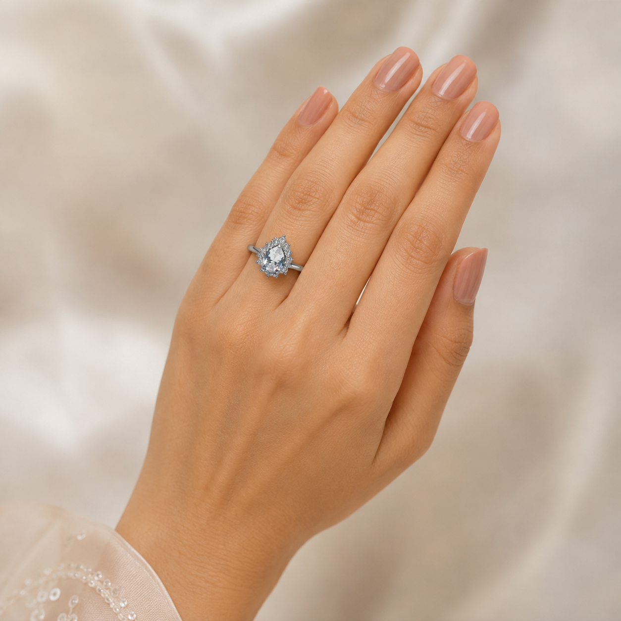 Silver Pear Cut Sunburst Halo Ring